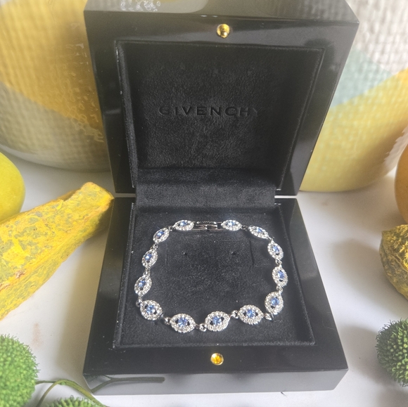 Givenchy Jewelry - NIB Givenchy Silver Tone Blue Crystals Tennis Bracelet
